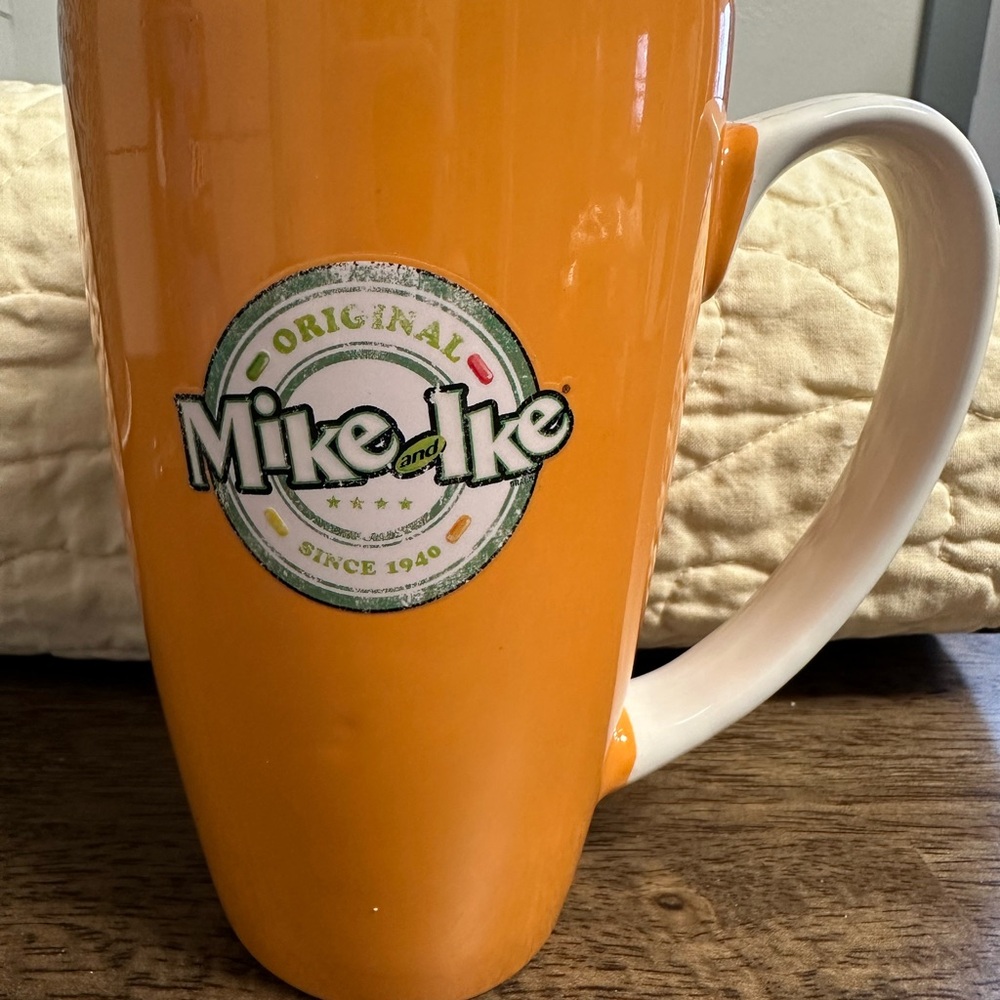 Orange Mug Mike and Ike Candy. Used in good shape